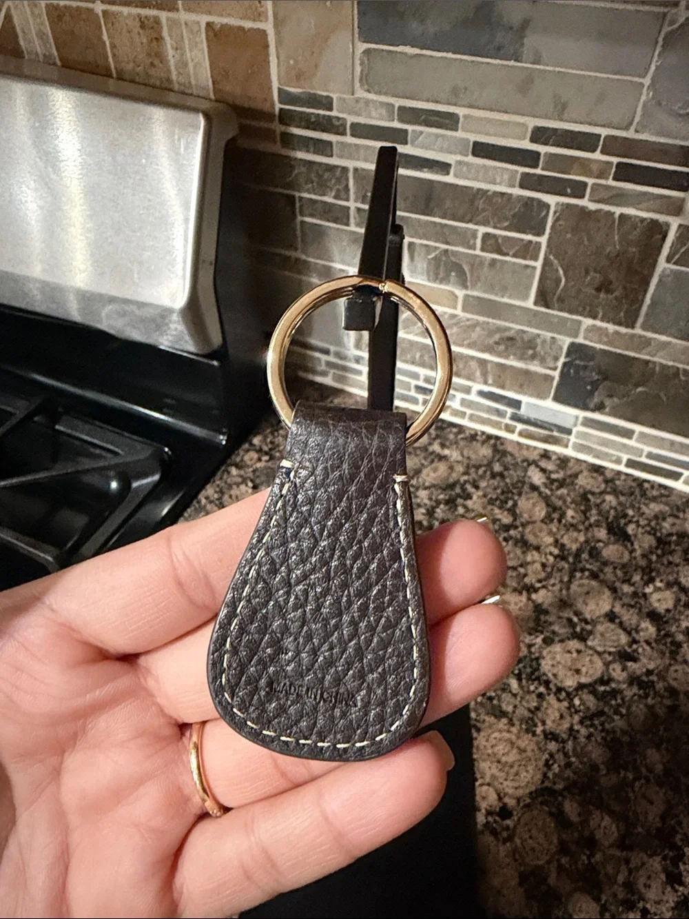 Dooney and Bourke Classic Brown Leather Key Fob with gold Metal Ring